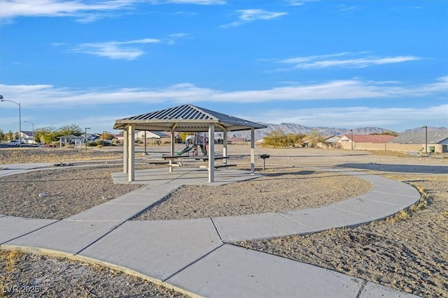 view of community featuring a gazebo and a mountain view