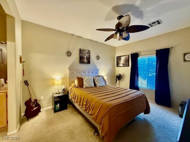 carpeted bedroom featuring ceiling fan