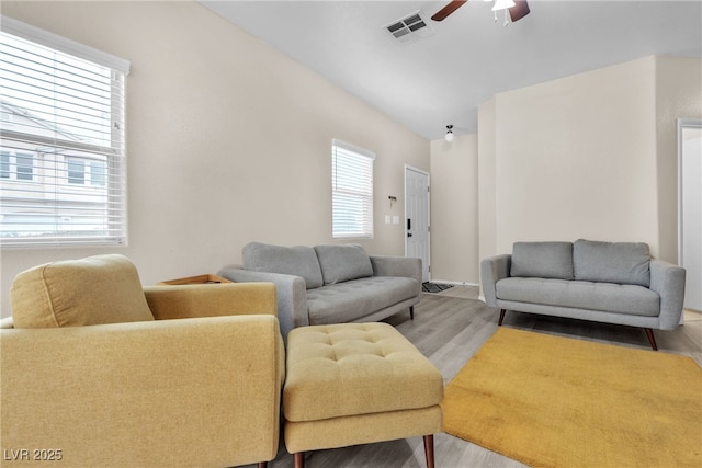 9323 Leaping Deer Pl Unit 102, Las Vegas, NV 89178 - living room with a ceiling fan and wood finished floors