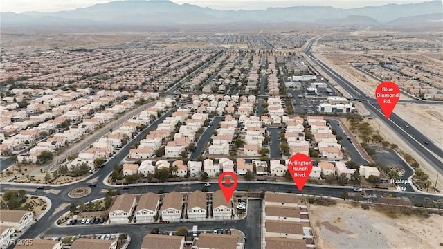 9323 Leaping Deer Pl Unit 102, Las Vegas, NV 89178 - aerial view of property and surrounding area with a mountainous background and nearby suburban area