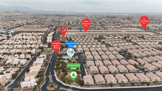 birds eye view of property featuring a residential view and a mountain view