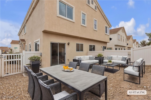 9323 Leaping Deer Pl Unit 102, Las Vegas, NV 89178 - fenced backyard featuring outdoor lounge area