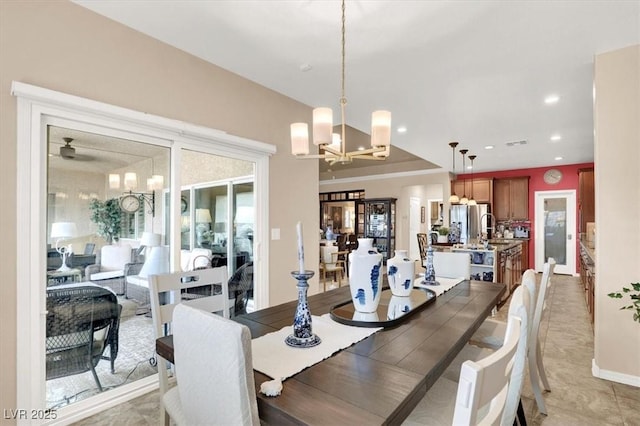 dining room featuring a notable chandelier