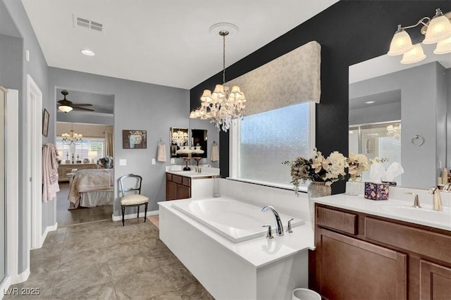 bathroom featuring independent shower and bath, vanity, and ceiling fan with notable chandelier