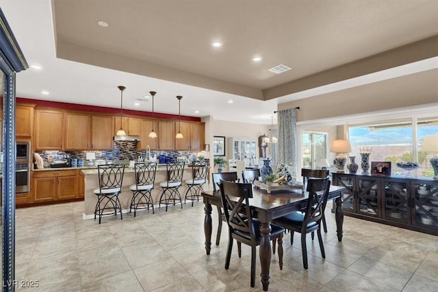 dining room featuring a notable chandelier