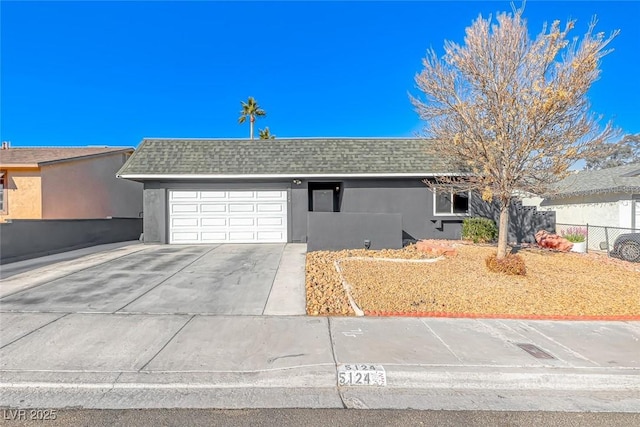 ranch-style home with a garage