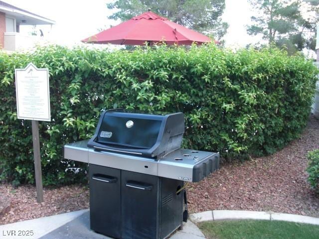 exterior space with a grill