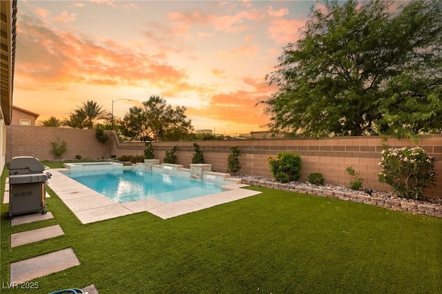 pool at dusk featuring a grill and a lawn