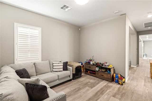 living room with light wood-type flooring