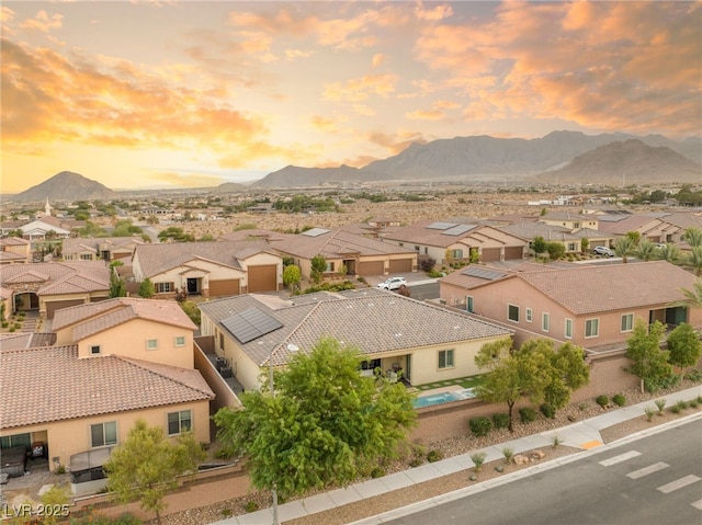 aerial view at dusk with a mountain view