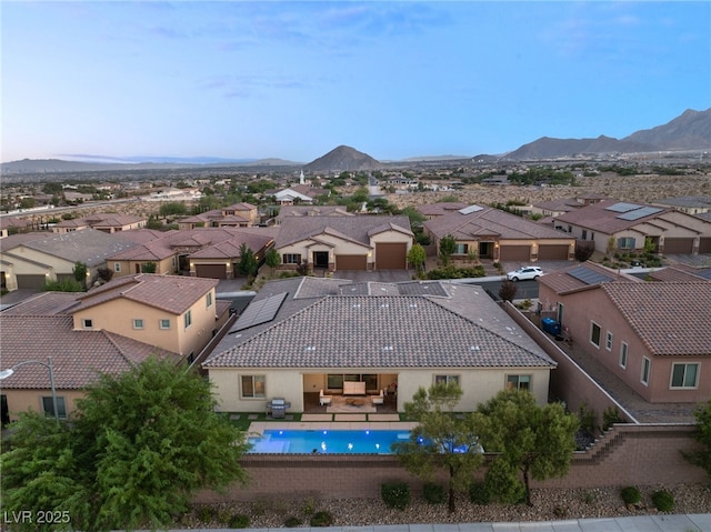 bird's eye view with a mountain view