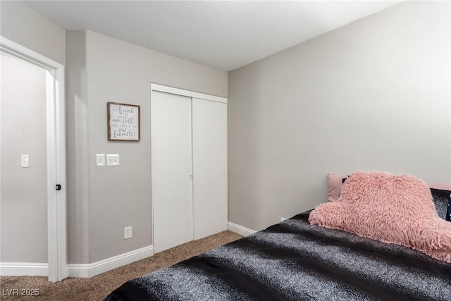 bedroom featuring a closet and carpet