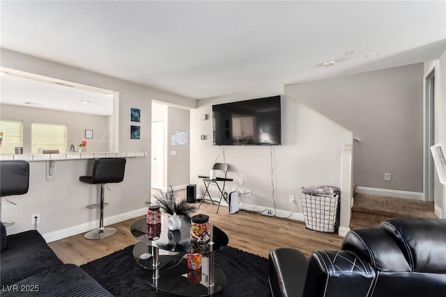 living room with hardwood / wood-style floors