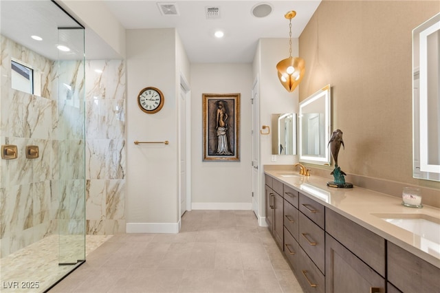 bathroom featuring vanity and a tile shower