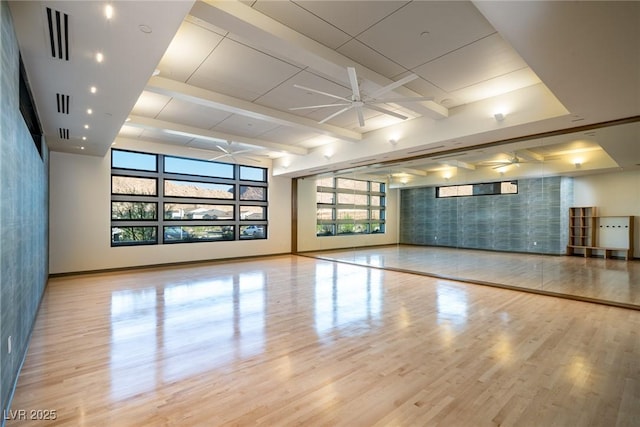 interior space featuring ceiling fan and light hardwood / wood-style flooring