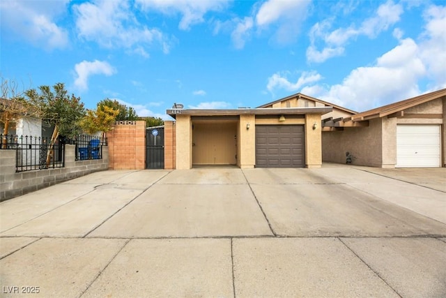 ranch-style home featuring a garage