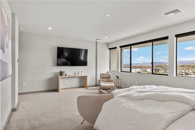 bedroom with light carpet, baseboards, visible vents, and recessed lighting