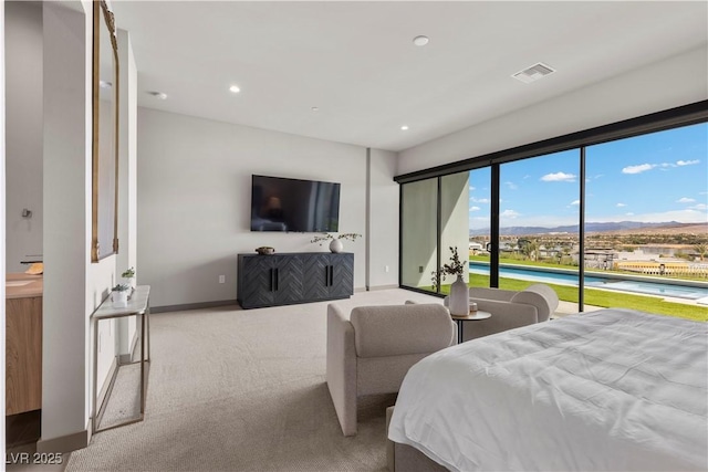 bedroom featuring recessed lighting, light colored carpet, visible vents, access to outside, and baseboards