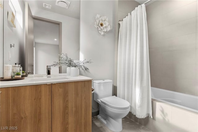 bathroom with tiled shower / bath, toilet, visible vents, and vanity