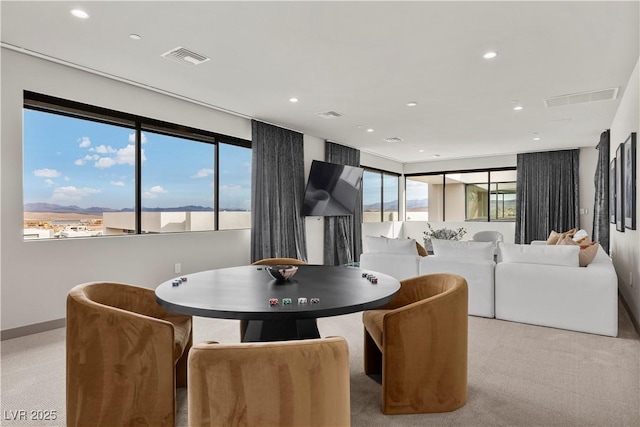 dining area featuring recessed lighting, light carpet, visible vents, and baseboards