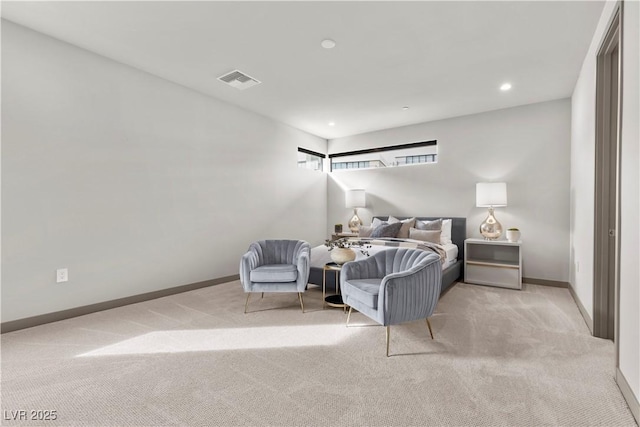 bedroom with light colored carpet, visible vents, baseboards, and recessed lighting