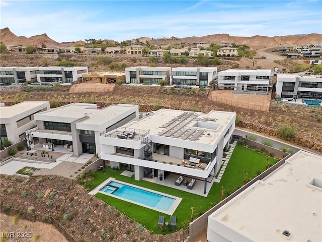 bird's eye view with a mountain view