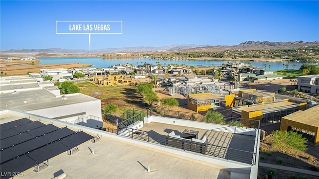 bird's eye view featuring a water and mountain view