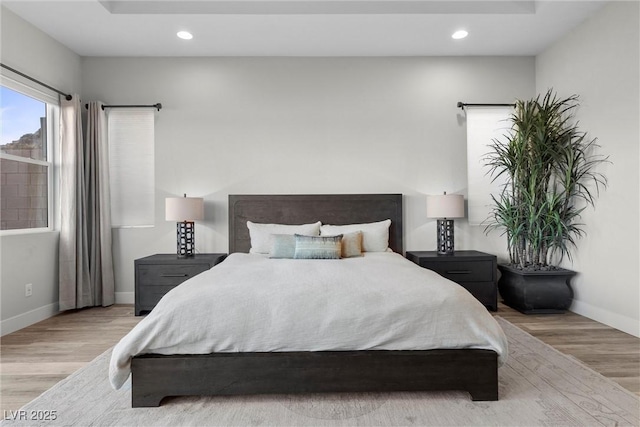 bedroom featuring light wood-type flooring