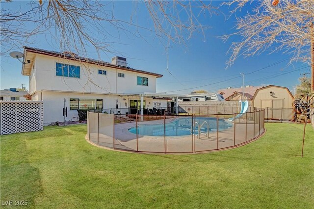 view of pool with a lawn, central air condition unit, and a water slide