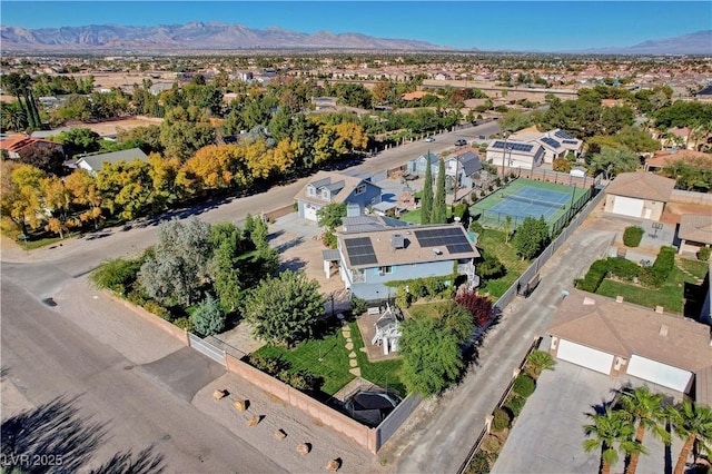 birds eye view of property featuring a mountain view