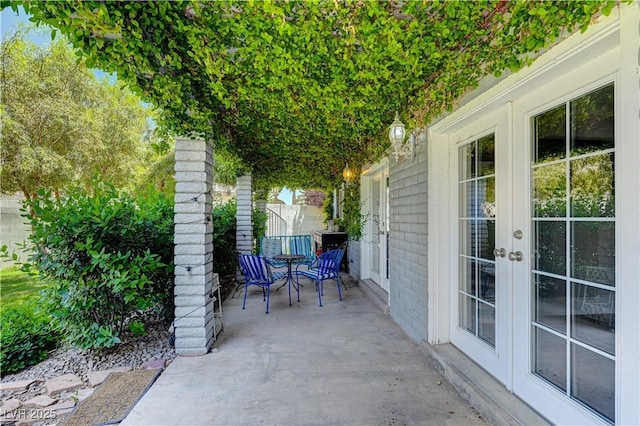 view of patio featuring french doors