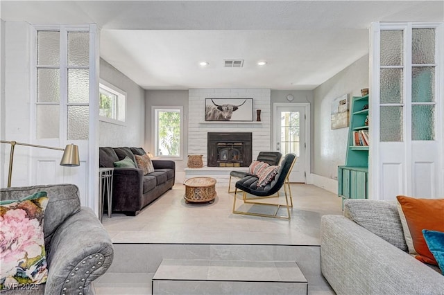 living room featuring a fireplace