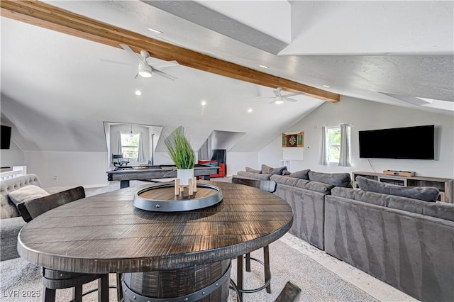 dining room featuring vaulted ceiling with beams and ceiling fan