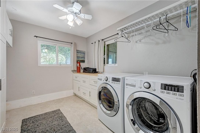 clothes washing area featuring light tile patterned floors, washing machine and dryer, cabinets, and ceiling fan