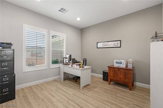 office area with light wood-type flooring