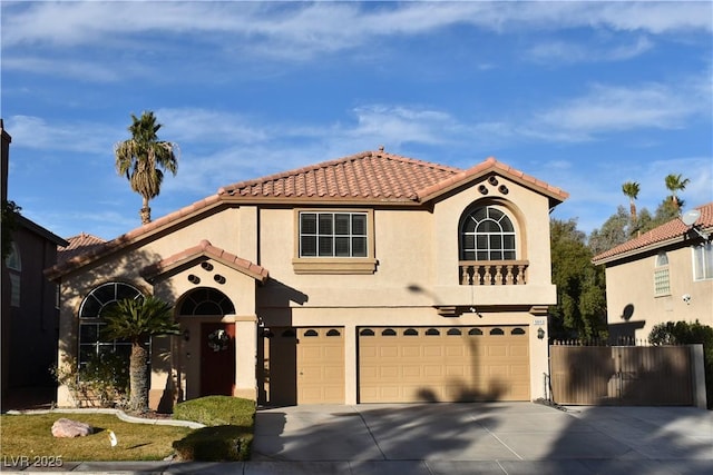 mediterranean / spanish-style home featuring a garage