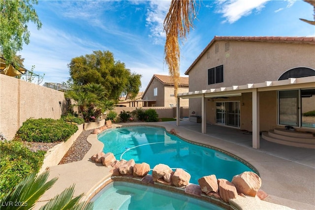 view of pool featuring a fenced in pool, a patio, and a fenced backyard