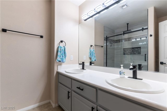 bathroom featuring a sink, visible vents, double vanity, and a shower stall