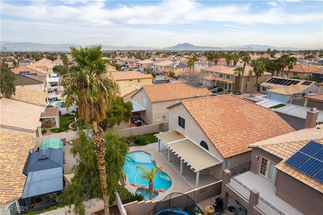 bird's eye view featuring a residential view and a mountain view