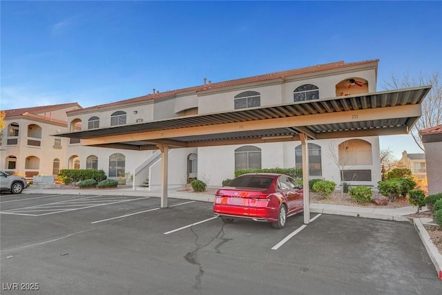 view of parking with a carport