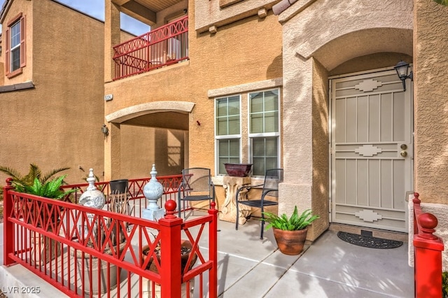 view of patio / terrace featuring a balcony