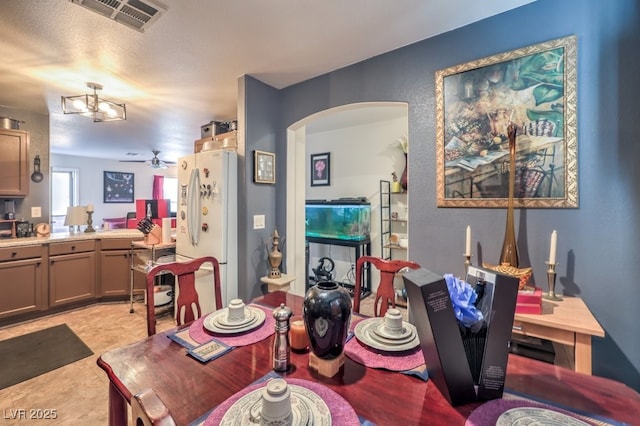 dining room featuring ceiling fan