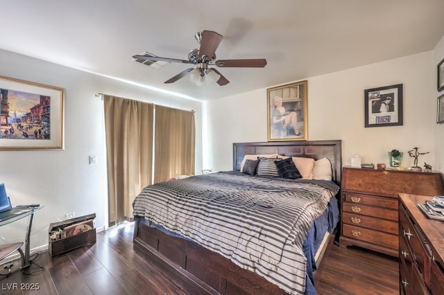 bedroom with ceiling fan and dark hardwood / wood-style flooring