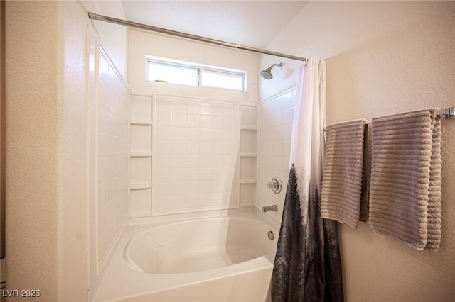 bathroom featuring shower / bathtub combination with curtain