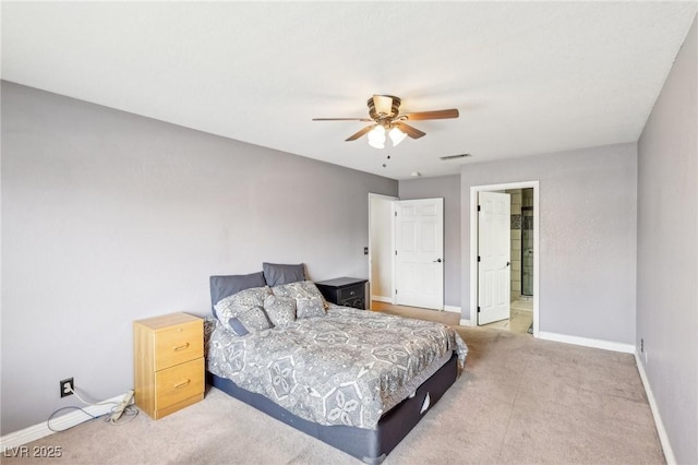 bedroom with connected bathroom and ceiling fan