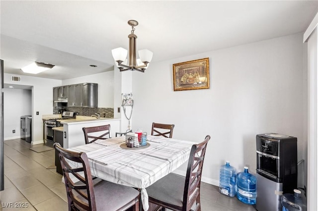 dining area with a chandelier