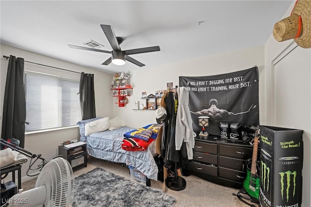 carpeted bedroom featuring ceiling fan