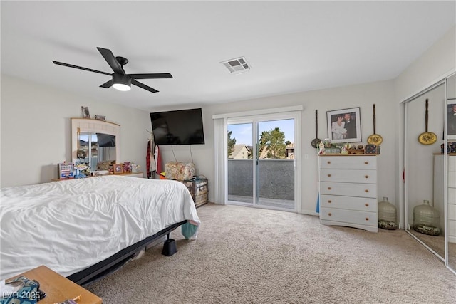 carpeted bedroom with access to outside and ceiling fan