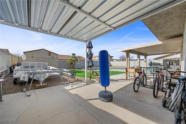 view of patio / terrace featuring a shed