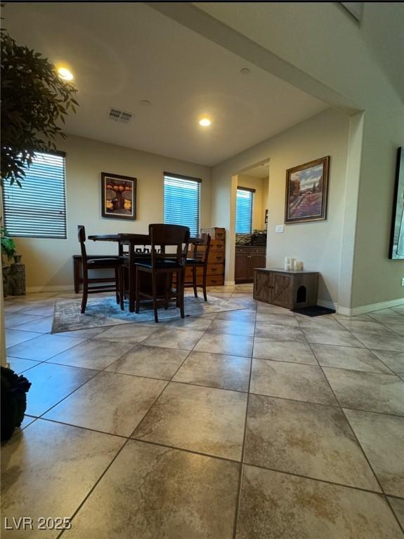 dining room with light tile patterned floors